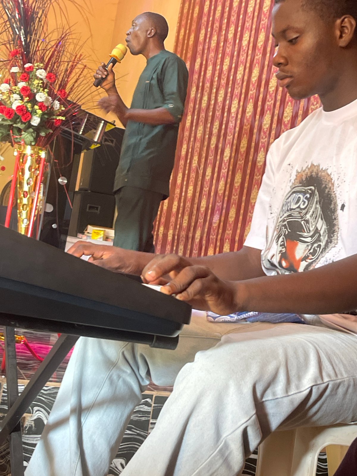 Religious service features traditional dress speaker and live music