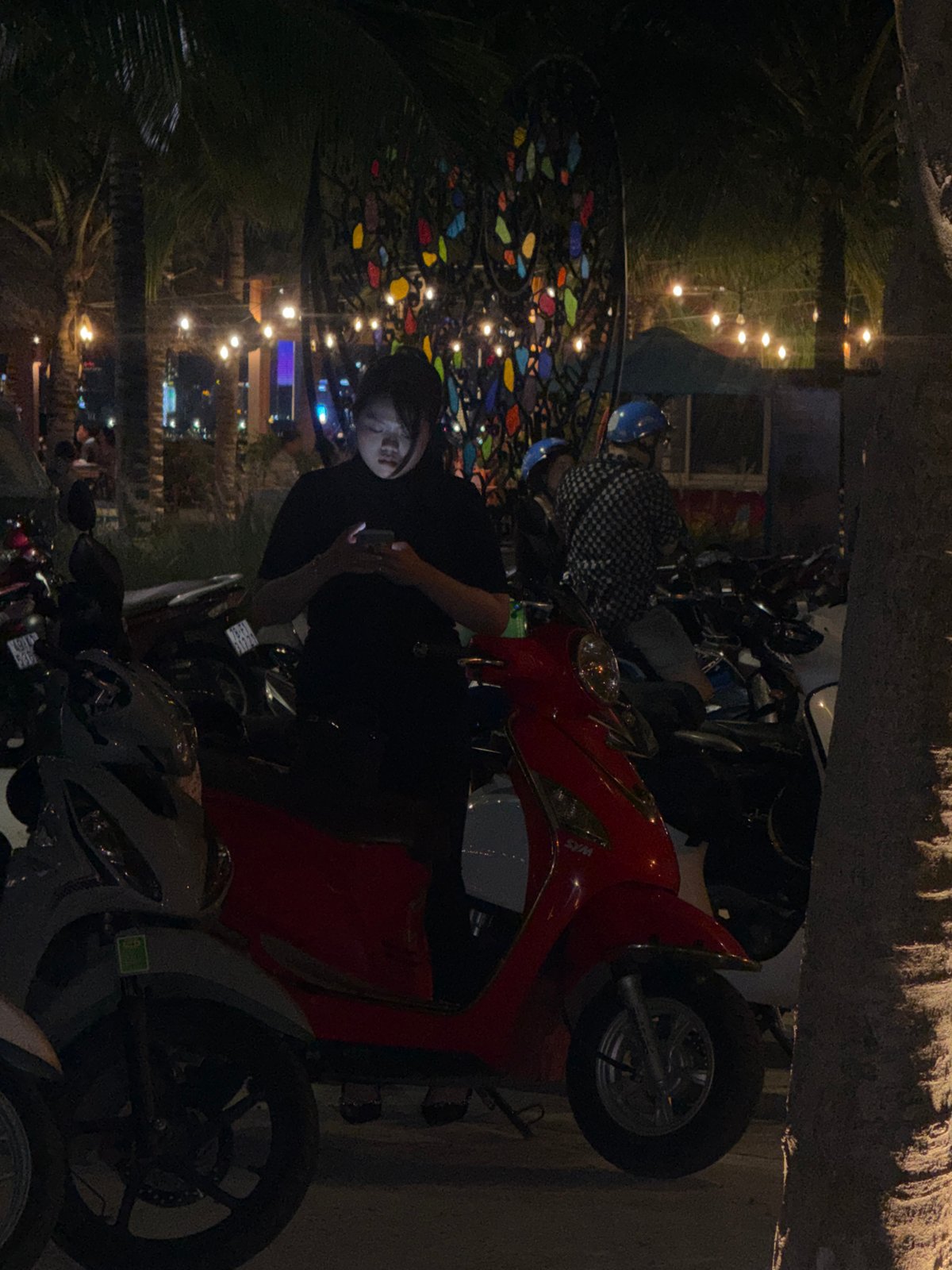 Evening life captured across waterfront Nha Trang neighborhood