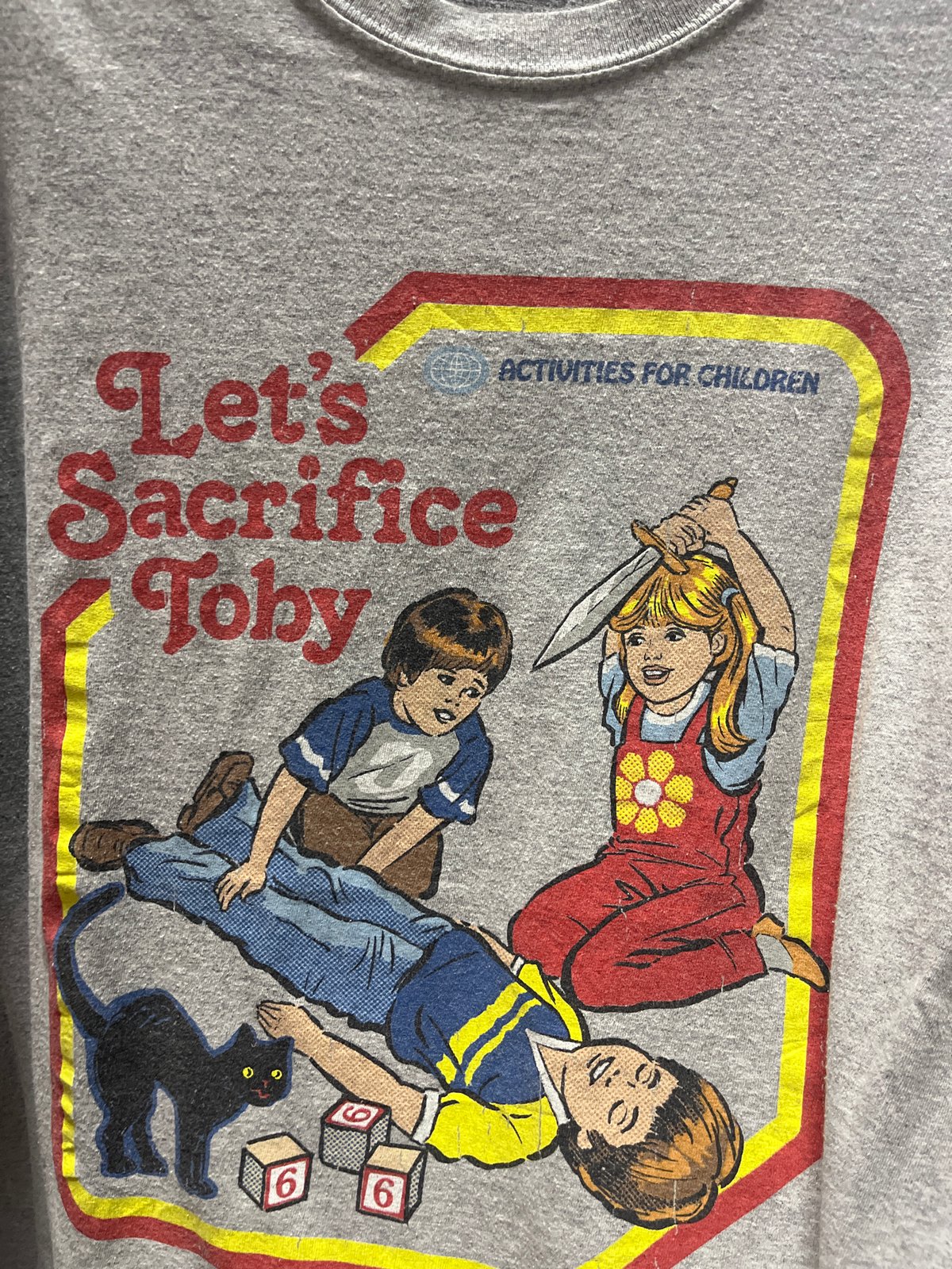 T-shirt displays unusual cartoon graphic in Montenegro village
