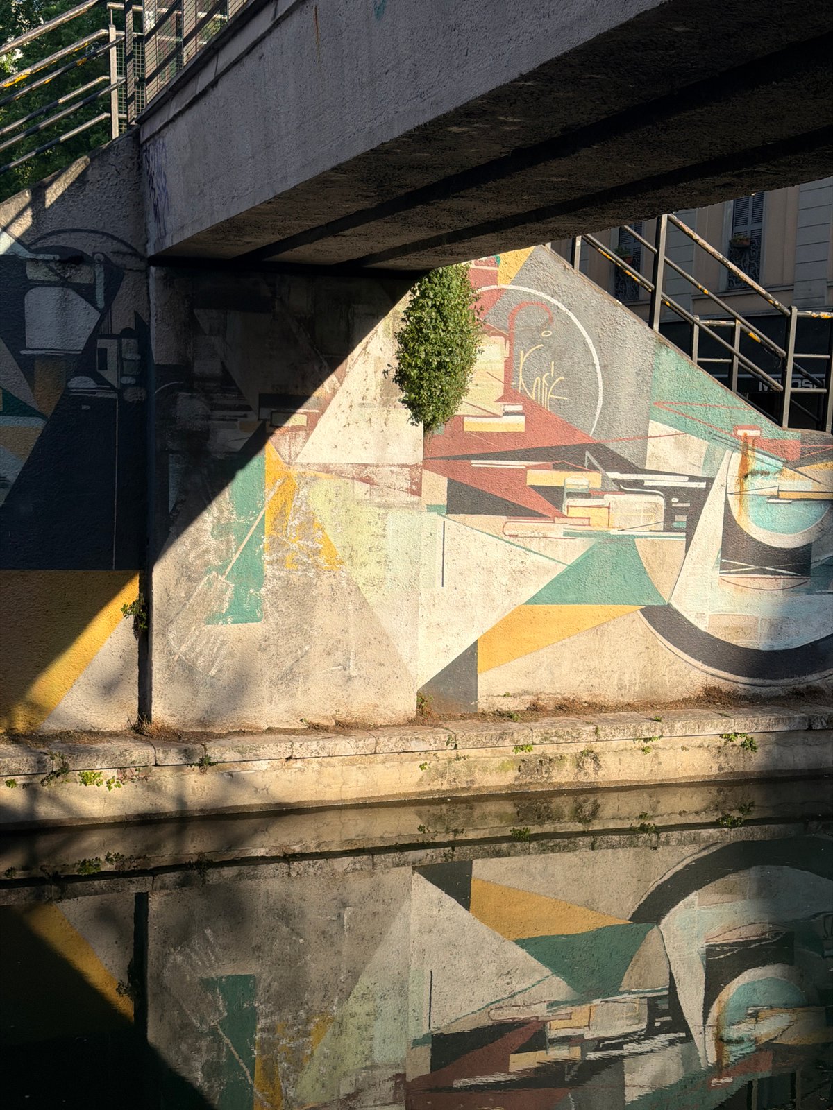 Concrete bridge structure documented in Milan urban scene
