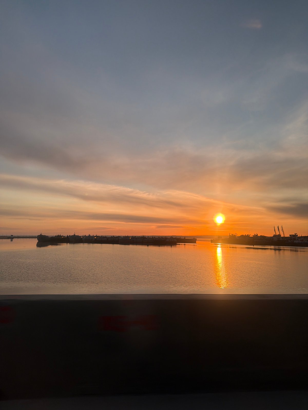Sunset observed over water in Chaikovsky, Russia