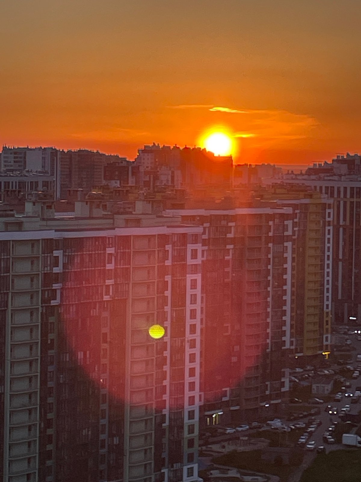 Vibrant sunset illuminates Saint Petersburg skyline