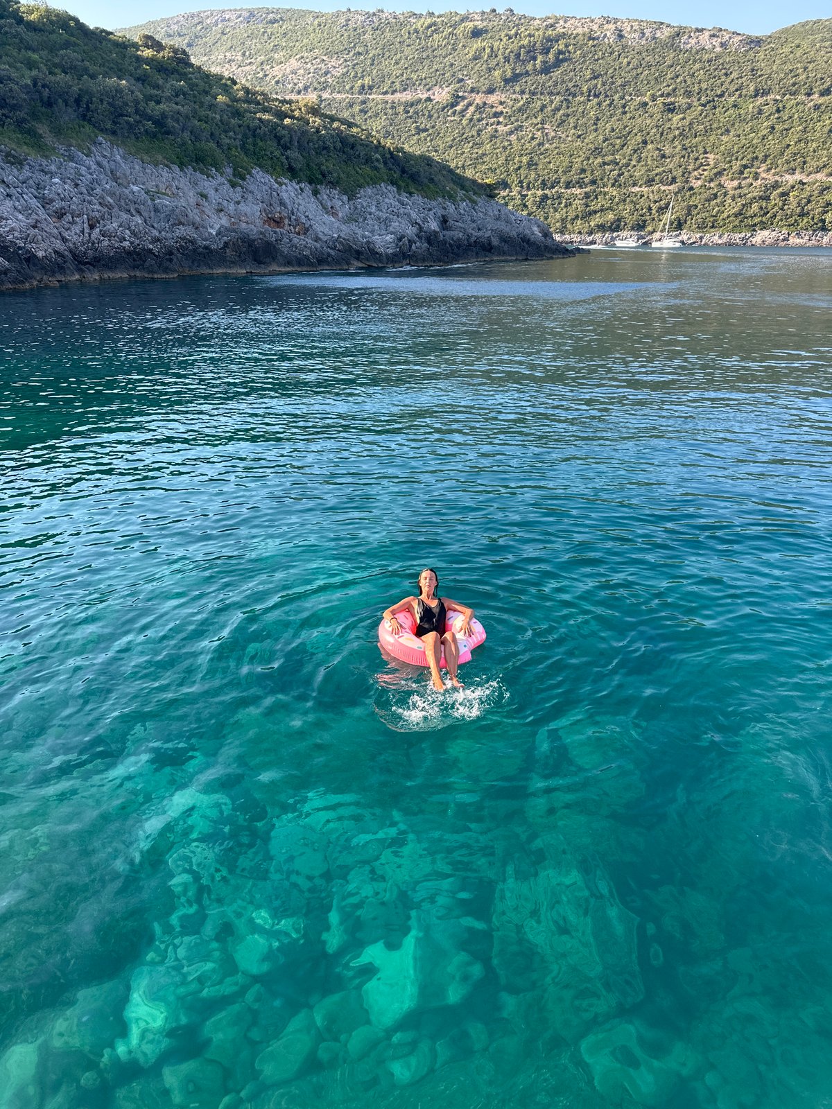 Sunny afternoon swimming and sunbathing at Dubraljevina bay