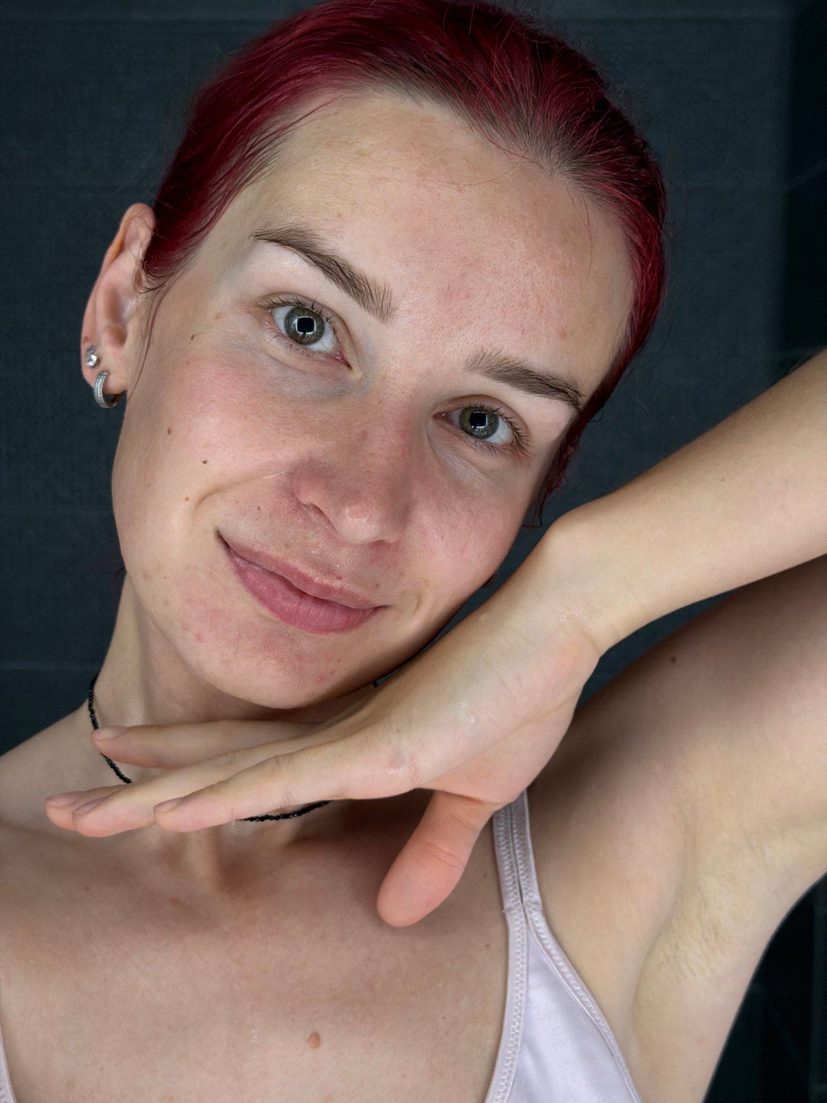 Woman documents morning skincare routine in Chaikovsky bathroom selfies