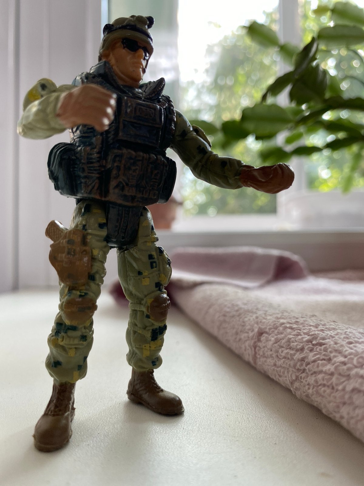 Toys, accessories, and home items photographed in a Kazakhstan household