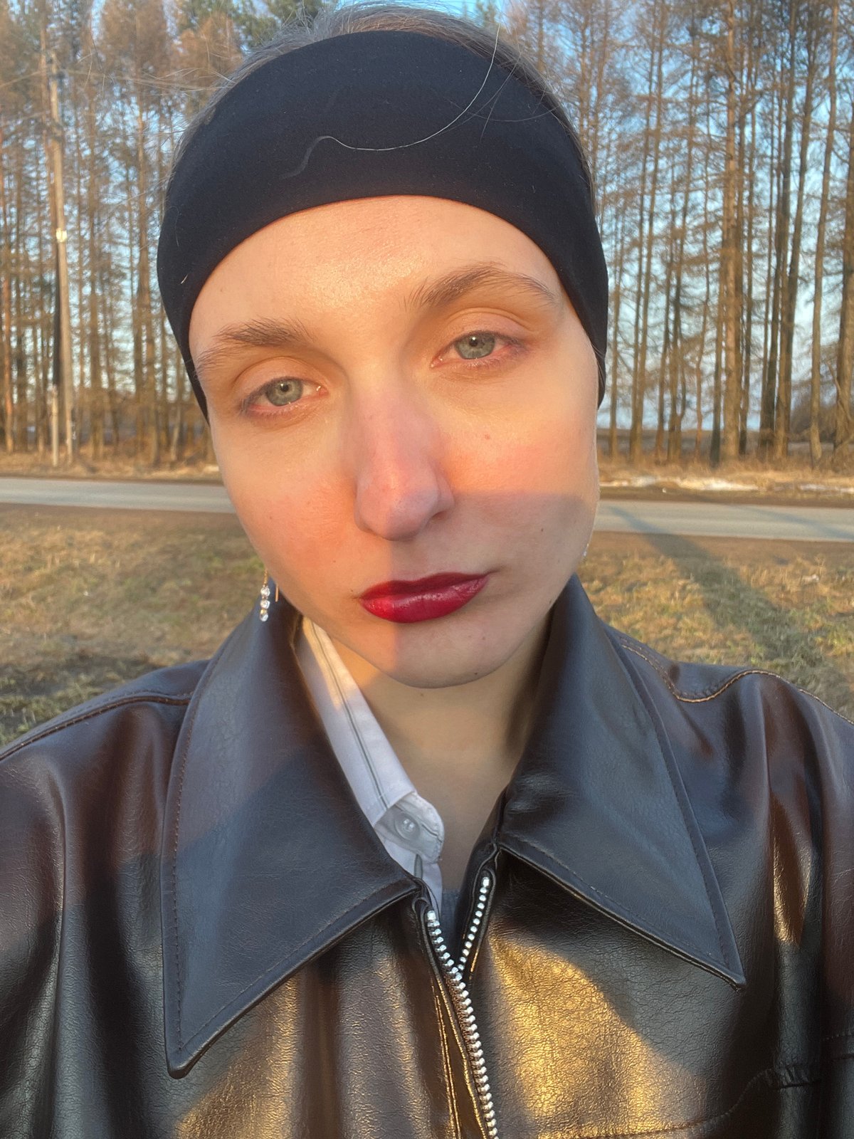 Woman documents muddy outdoor visit in Russian village