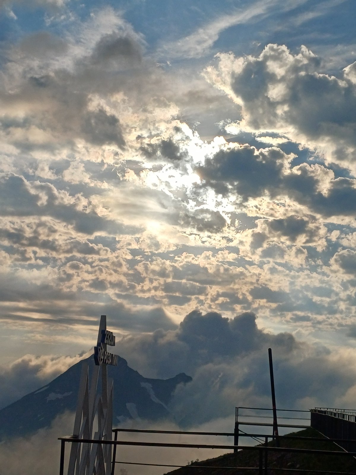 Summer day at Estosadok mountain resort, gondolas and snowy peaks