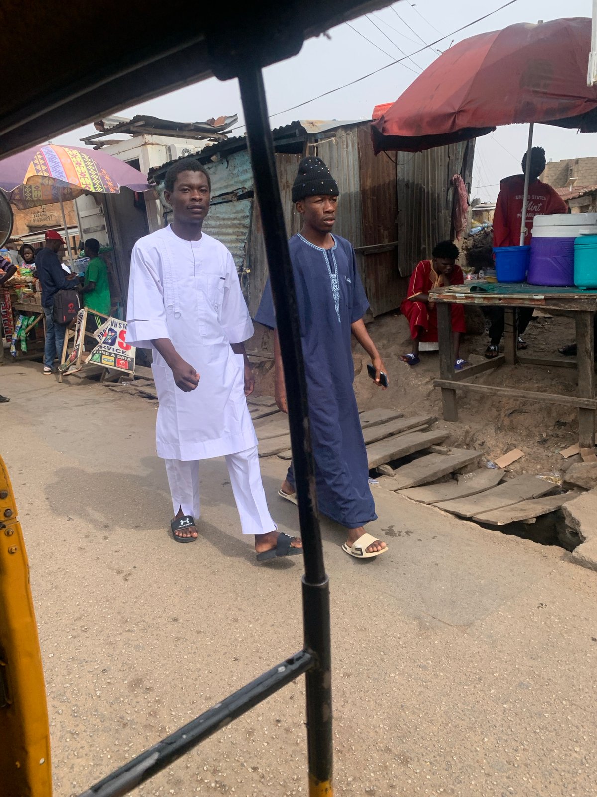 Daytime street view captured from keke in Jos, Nigeria