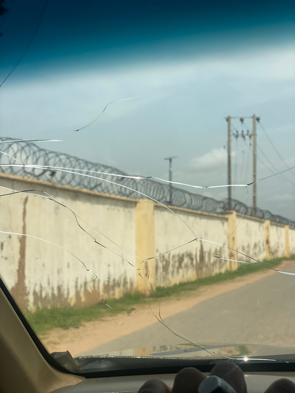 Car journey documented through residential Howayi, Nigeria neighborhoods