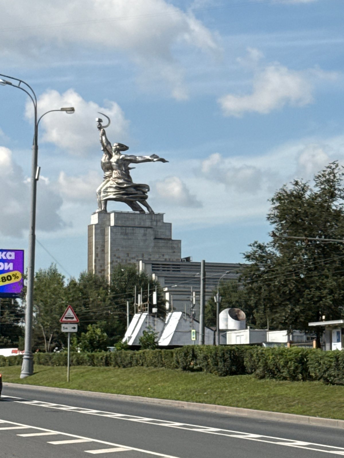 Soviet monument towers over Moscow skyline on a cloudy day