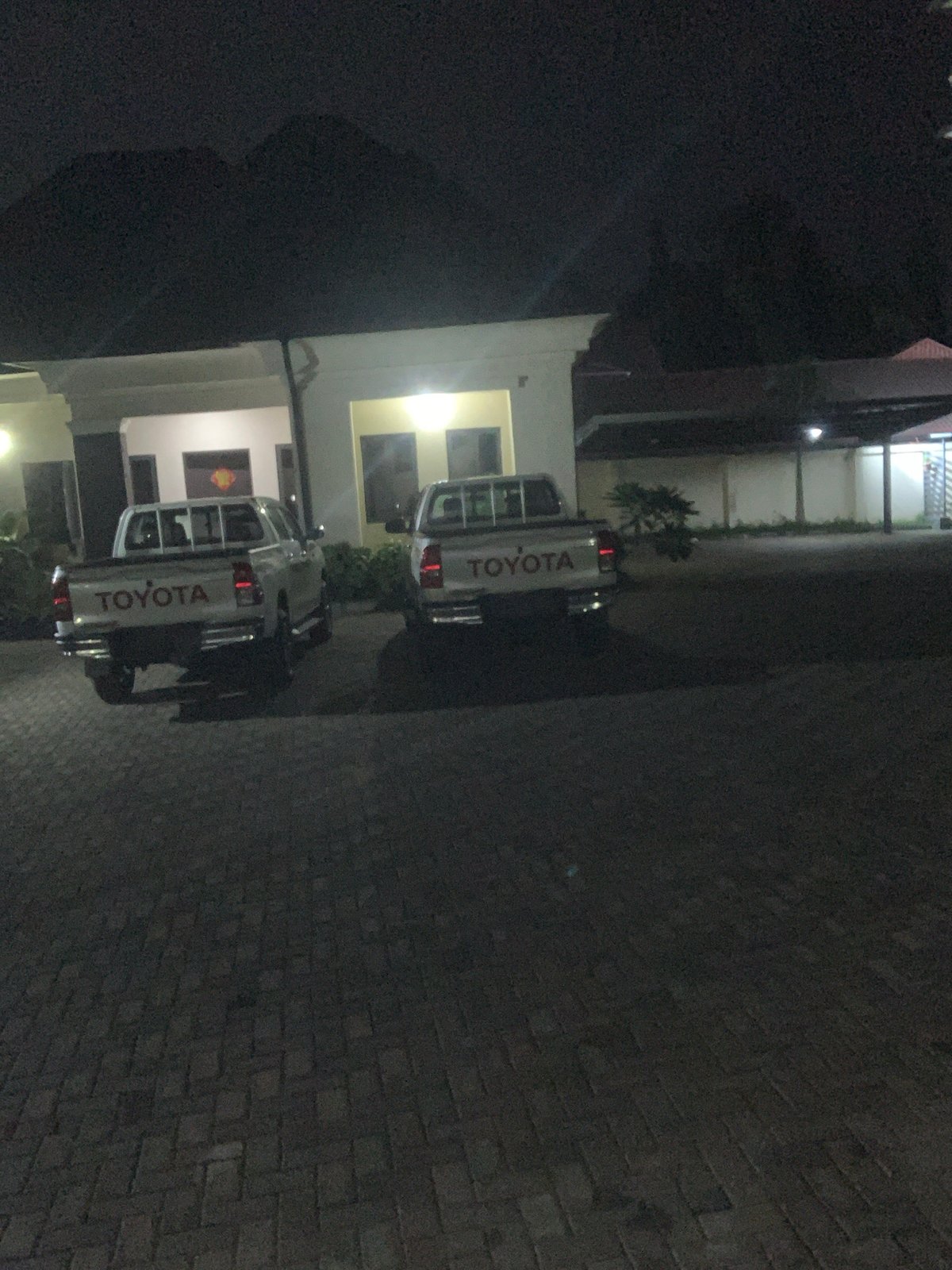 Night scenes around a property in Abuja, inside and out