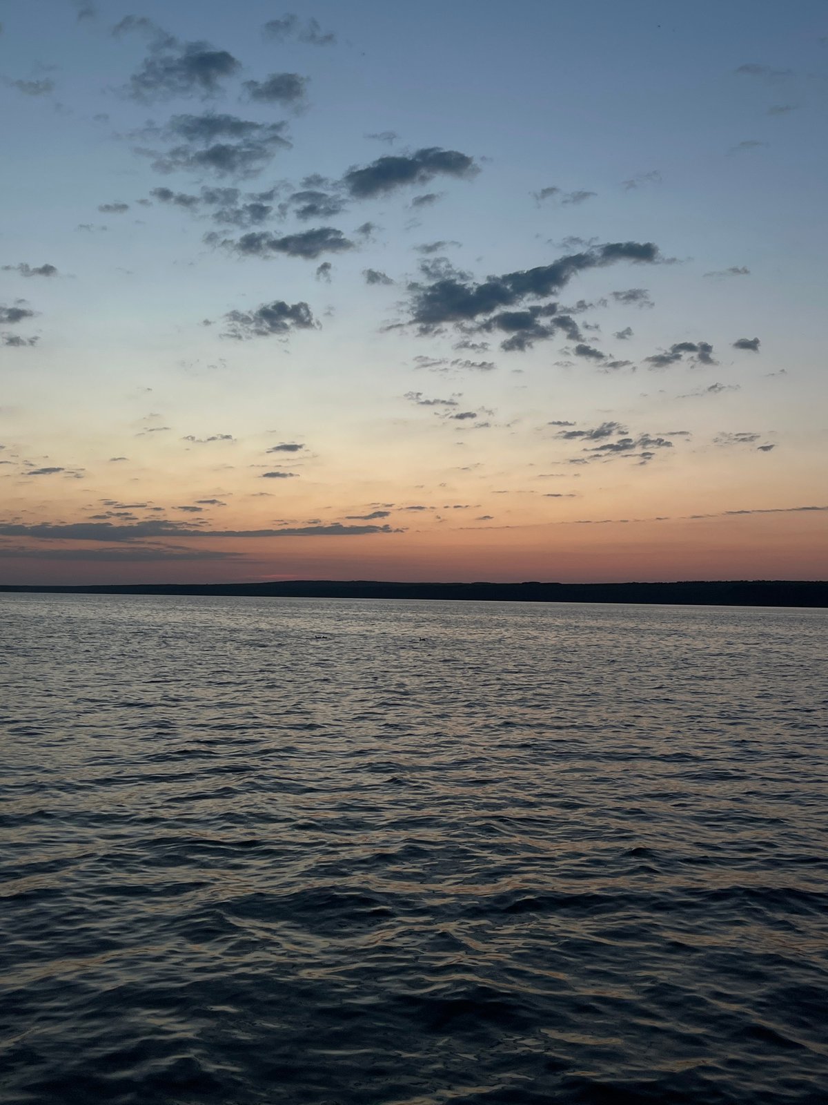 Dusk scenes captured along Kama River waterfront in Chaikovsky
