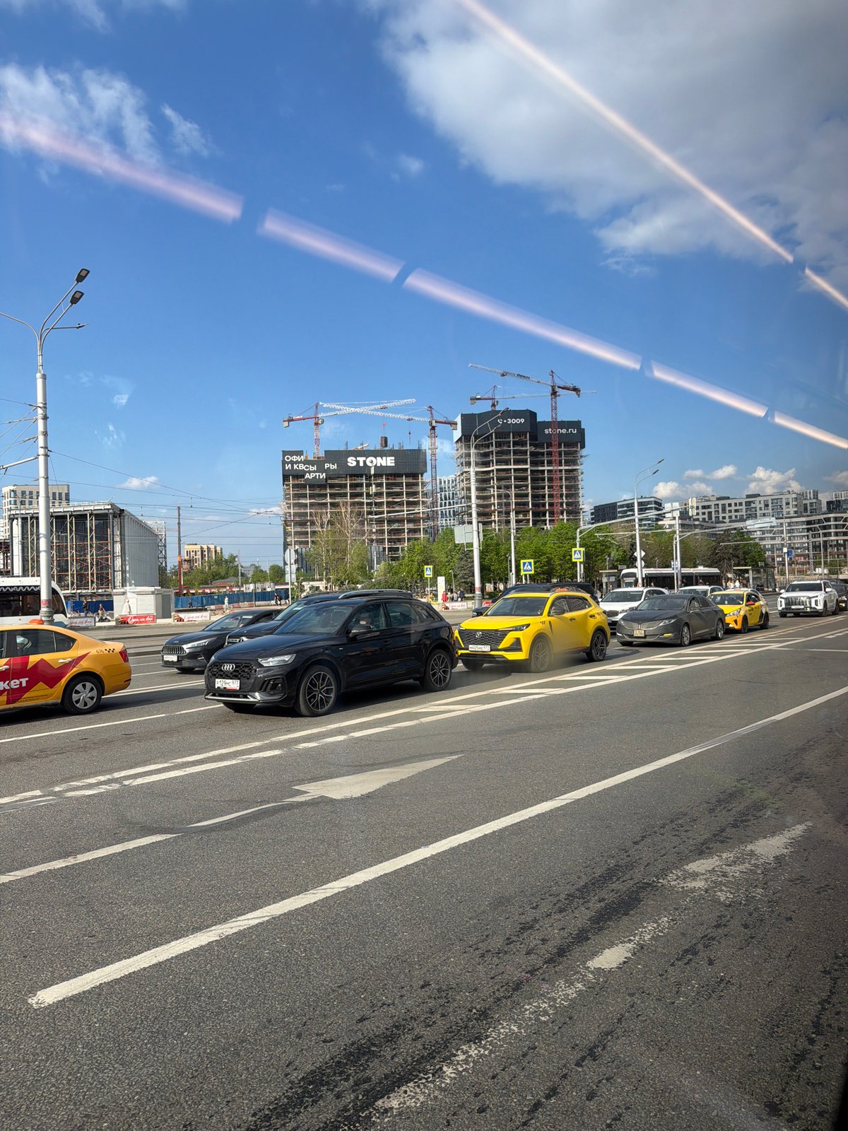 Moscow street scenes documented by observers during midday traffic