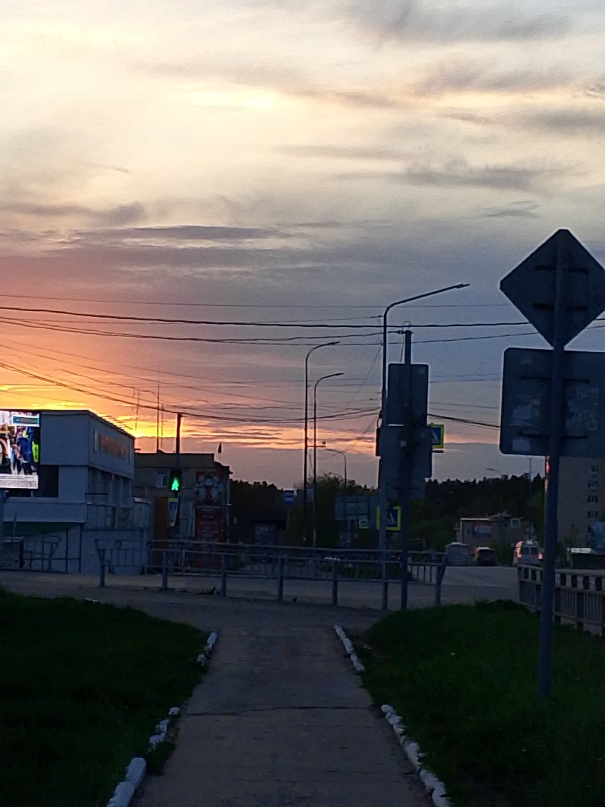 Sunset drive documented through Chaikovsky, Russia streets