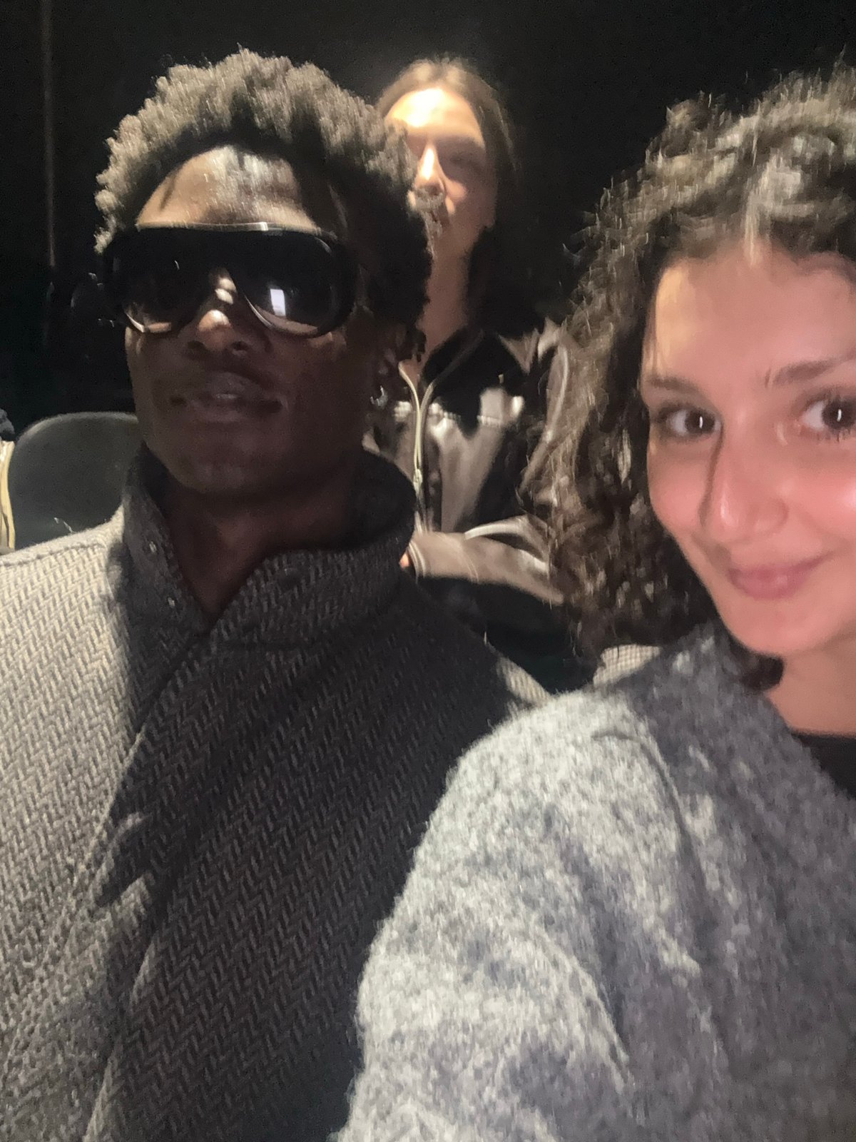 Comedy show and audience interactions at London club
