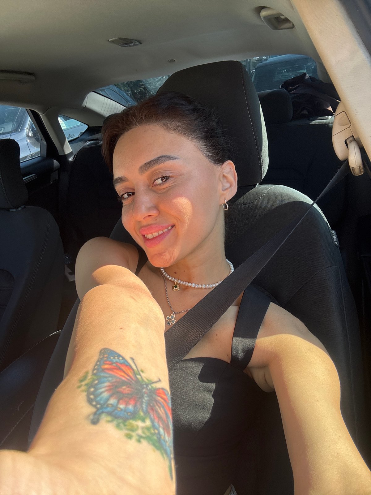 Casual in-car moments with two people in Tbilisi