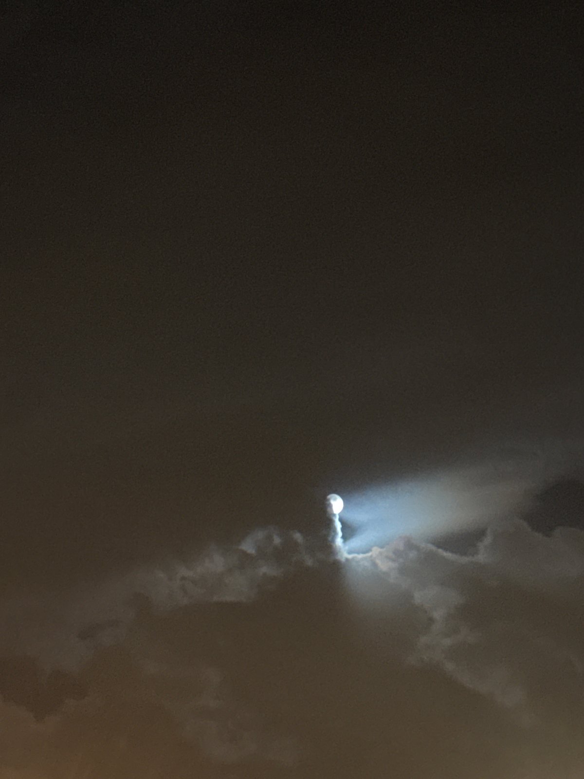 Bright circular object with trails observed in Moscow night sky