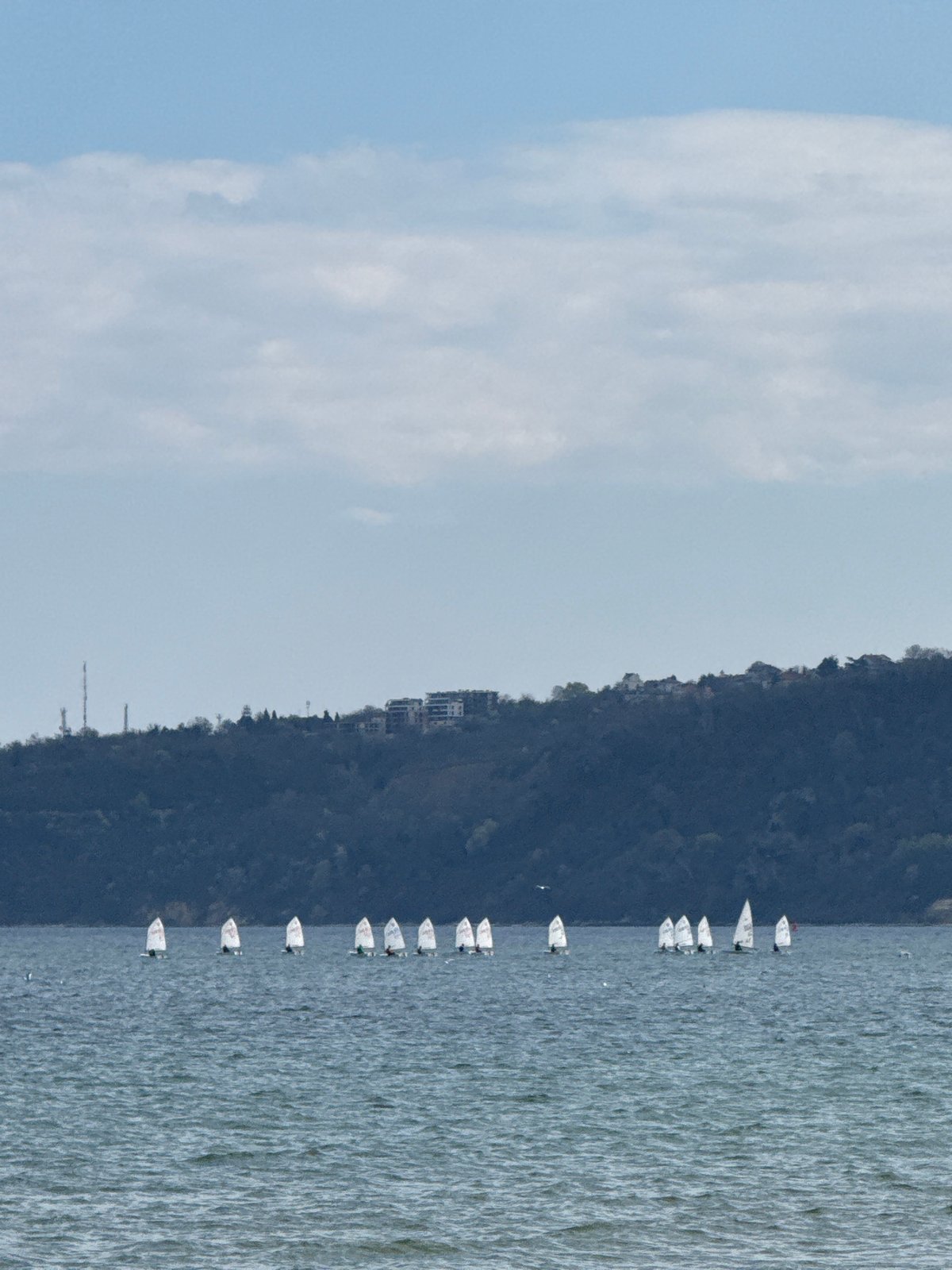 Spring afternoon brings sailors and beachgoers to Varna coast