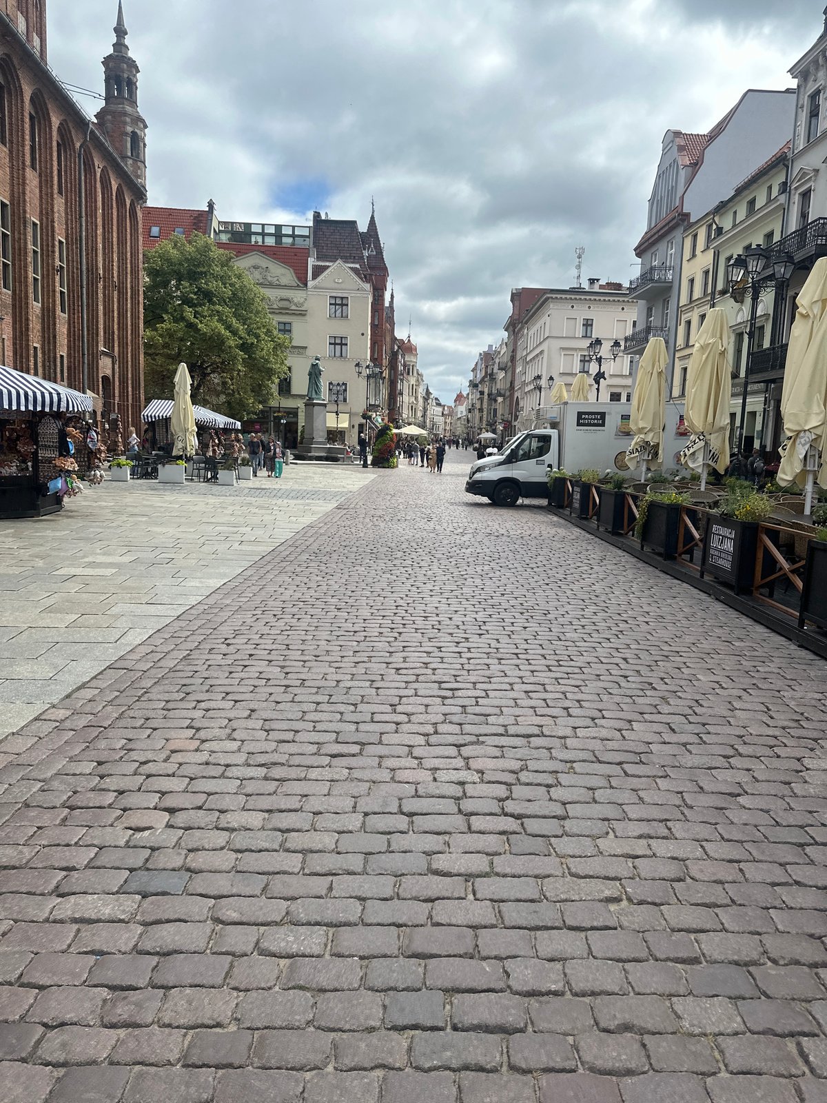 Toruń Old Town streets, architecture, and landmarks on a cloudy morning