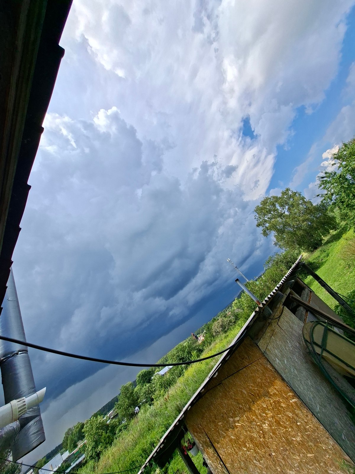 Storm clouds over Karsha fields, wildflowers, and a quiet morning indoors
