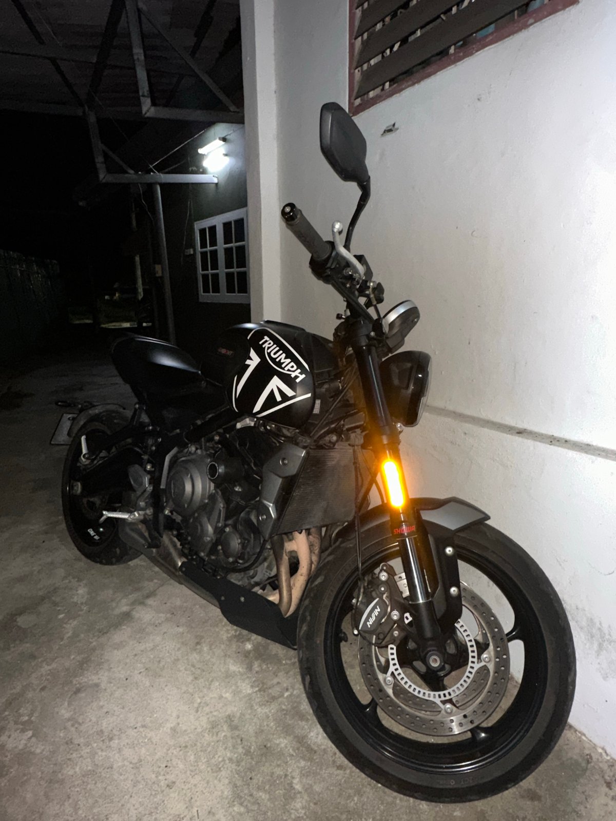 Motorcycles and convenience store browsing in Karon