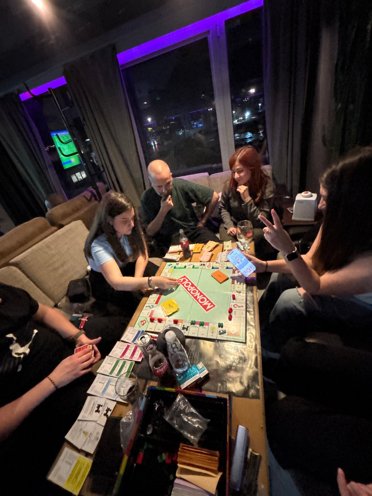 Friends gather for Monopoly and pool games at Plovdiv bar
