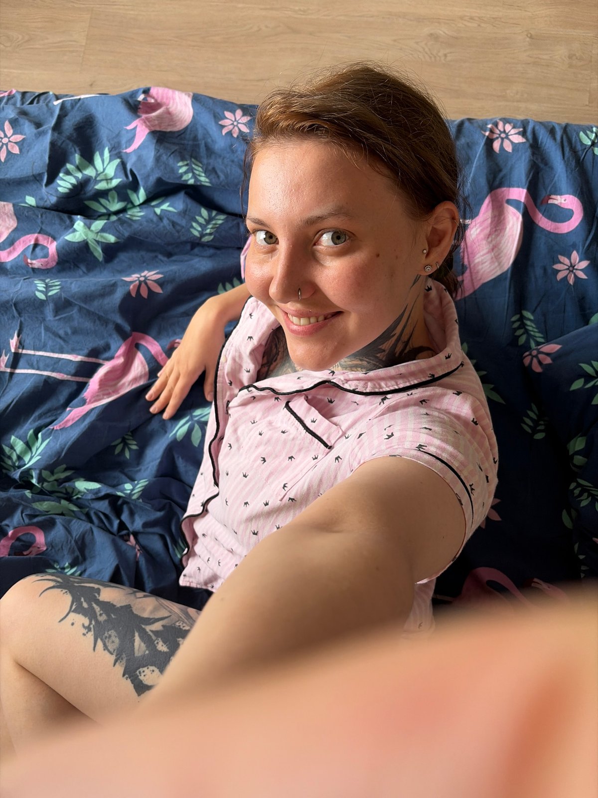 Relaxing on flamingo-print bedding in Izhevsk