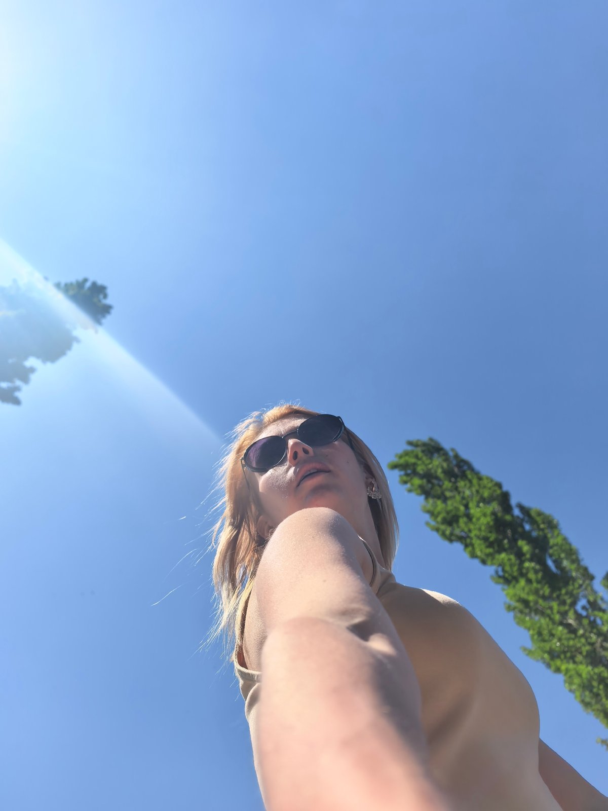 Woman takes selfies during morning walk in Sterlitamak, Russia