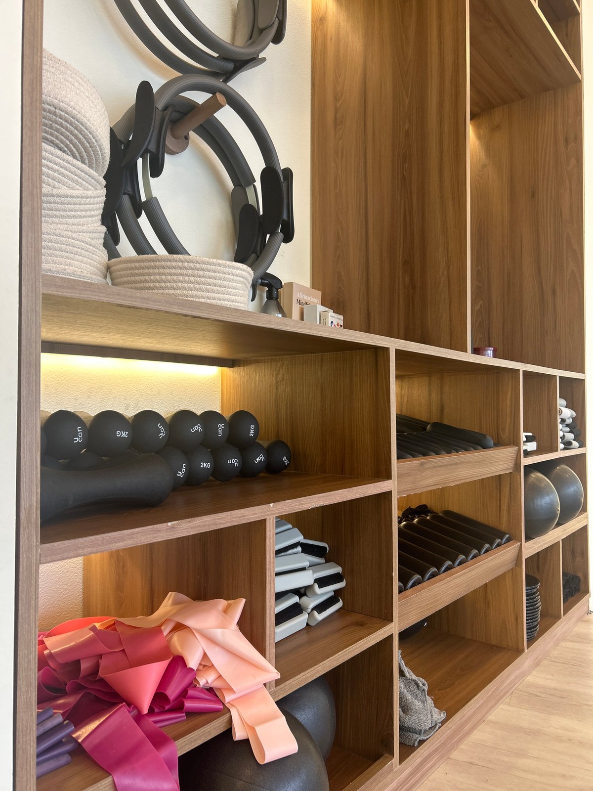 Fitness studio activity documented during equipment organization session