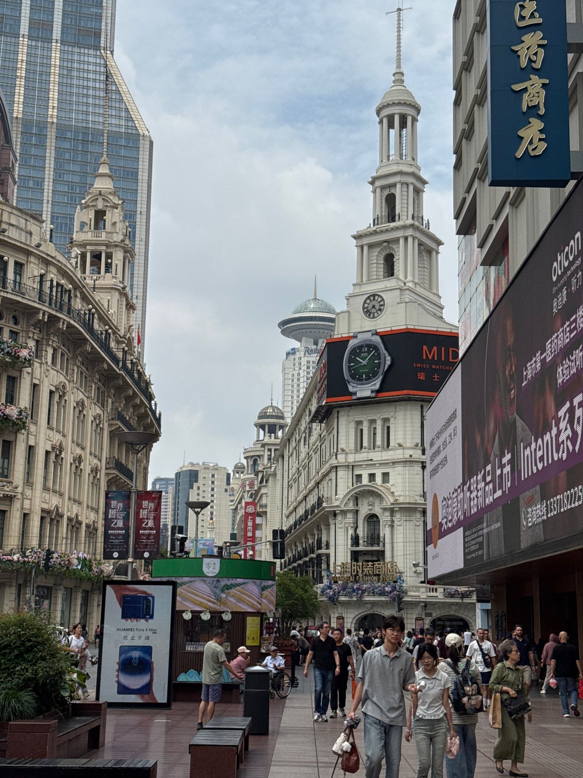 Strolling Shanghai's Nanjing Road shopping district on a cloudy morning