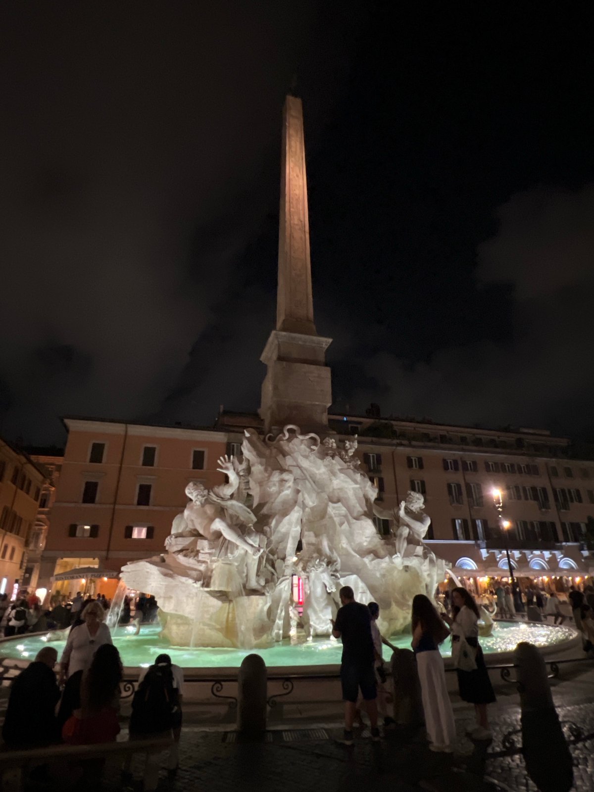 Rome's historic fountains illuminate evening squares