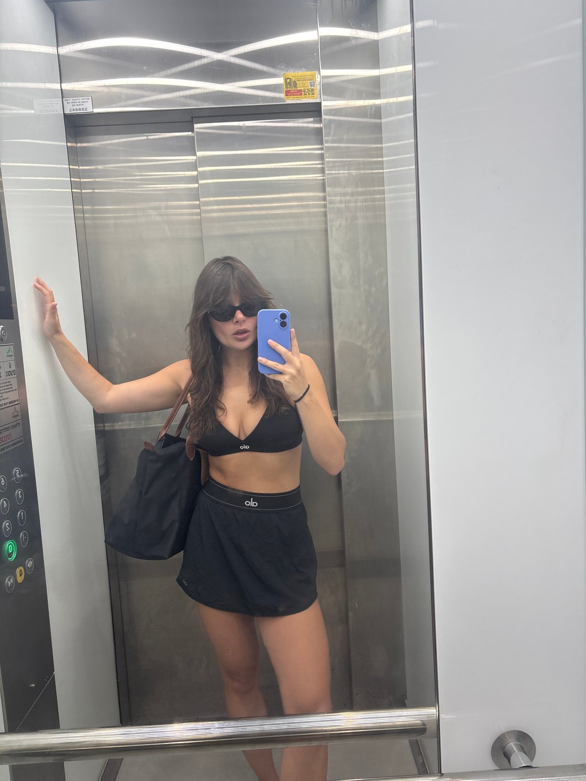 Alo athletic fit selfies in a Tel Aviv apartment and elevator