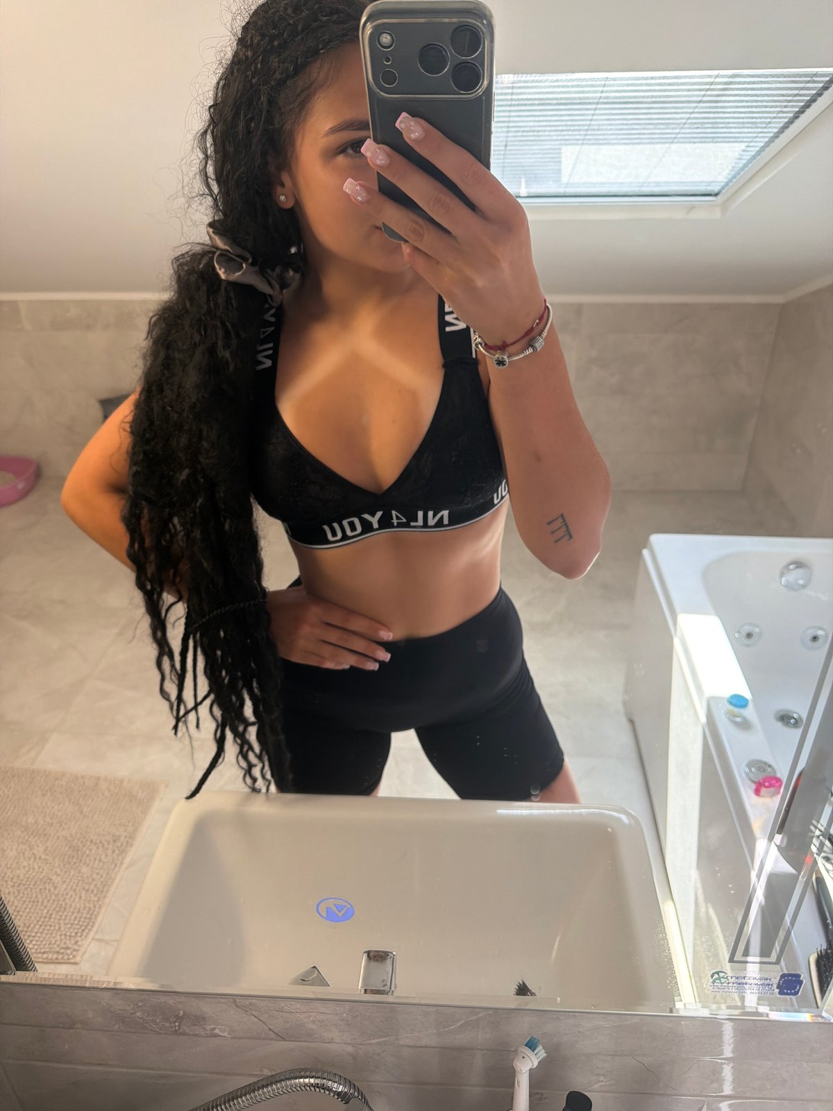 Bathroom mirror selfies and a black cat in Gabrovo