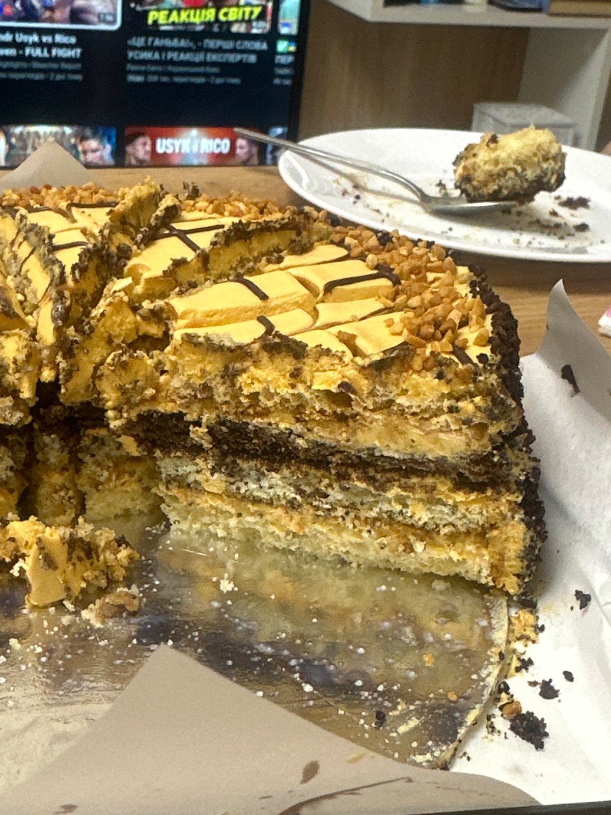Evening celebration documented in Ternopil with cake, chocolates, drinks