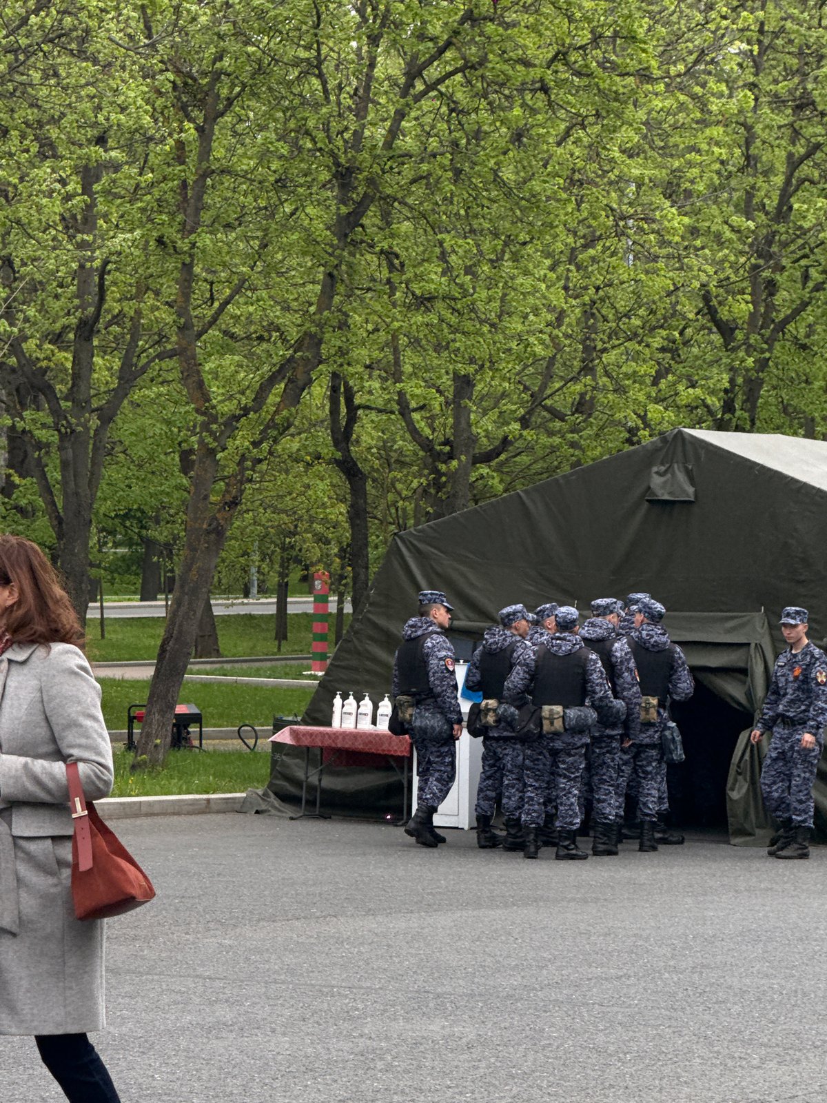 Moscow park scenes: uniformed group, squirrel spotted May 9