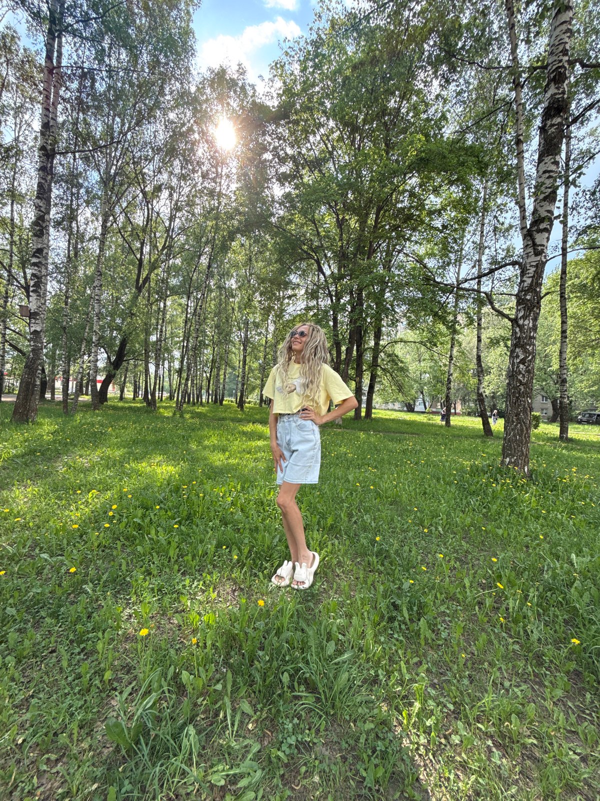 Family outing photographed in Rusanovo park, Russia