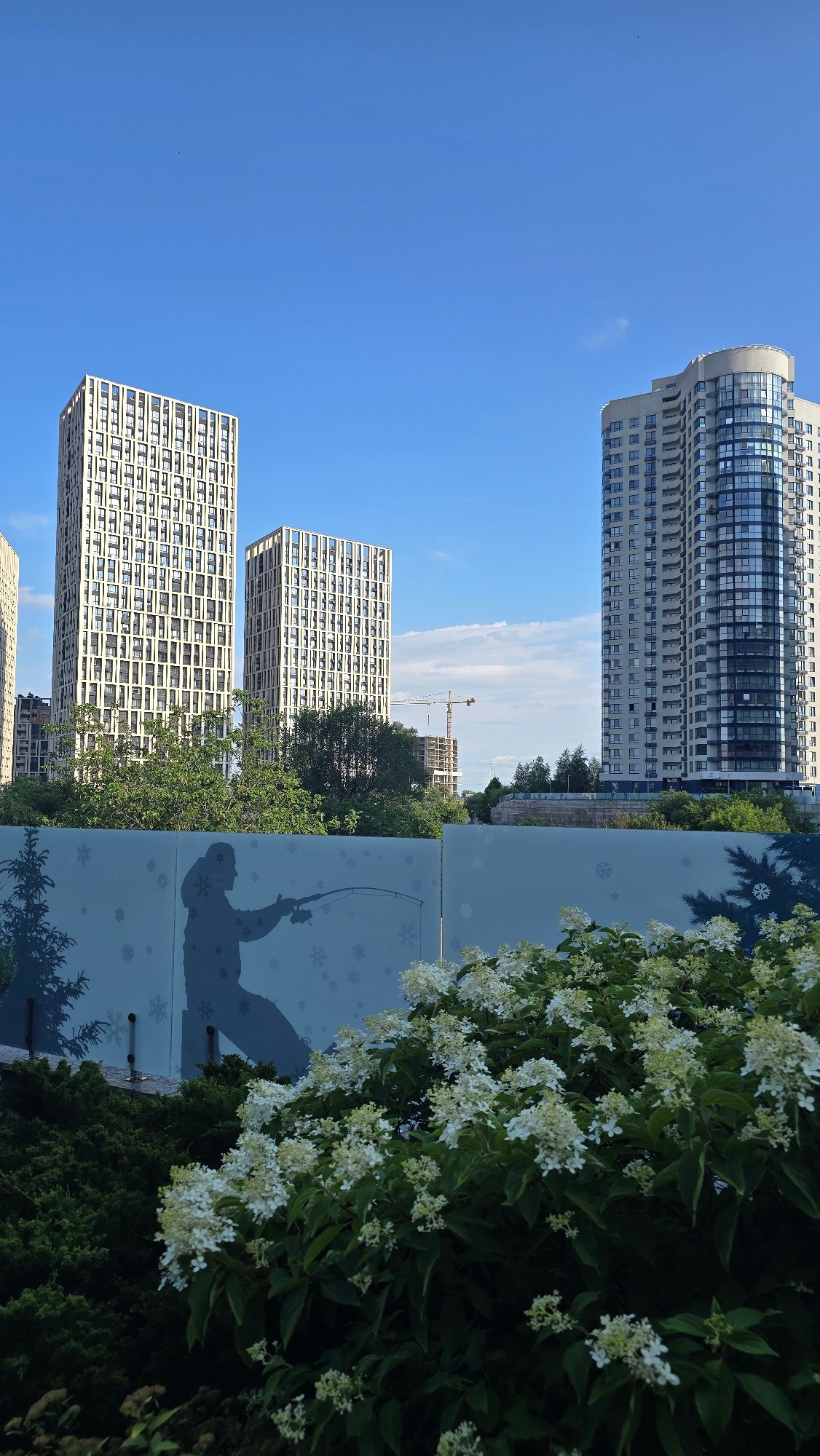 Kyiv residential complex with decorative glass fence and city views