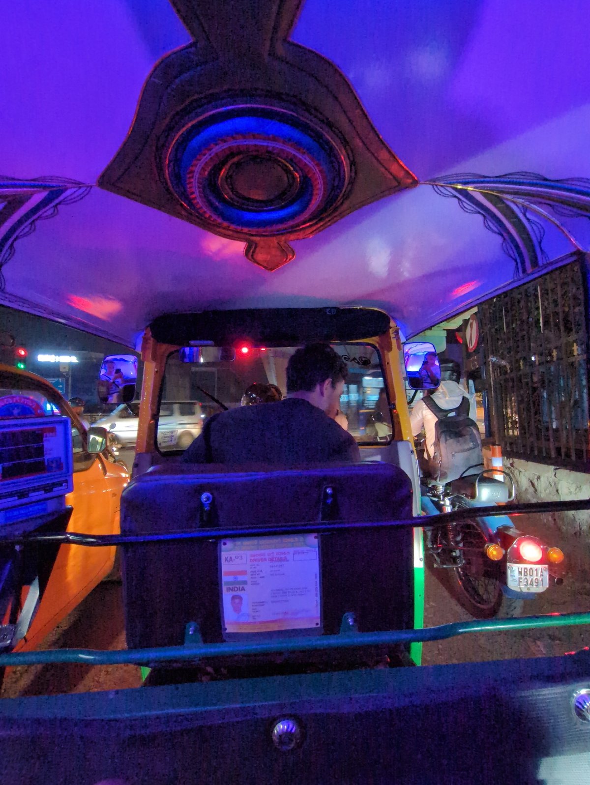 Nighttime auto-rickshaw ride documented in Bengaluru streets