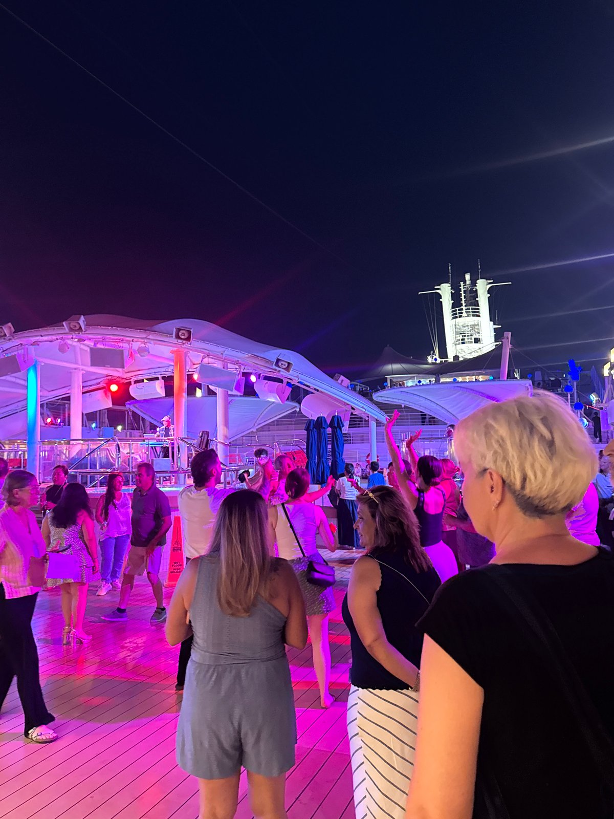 Nighttime deck party with DJ in Salobreña, Spain