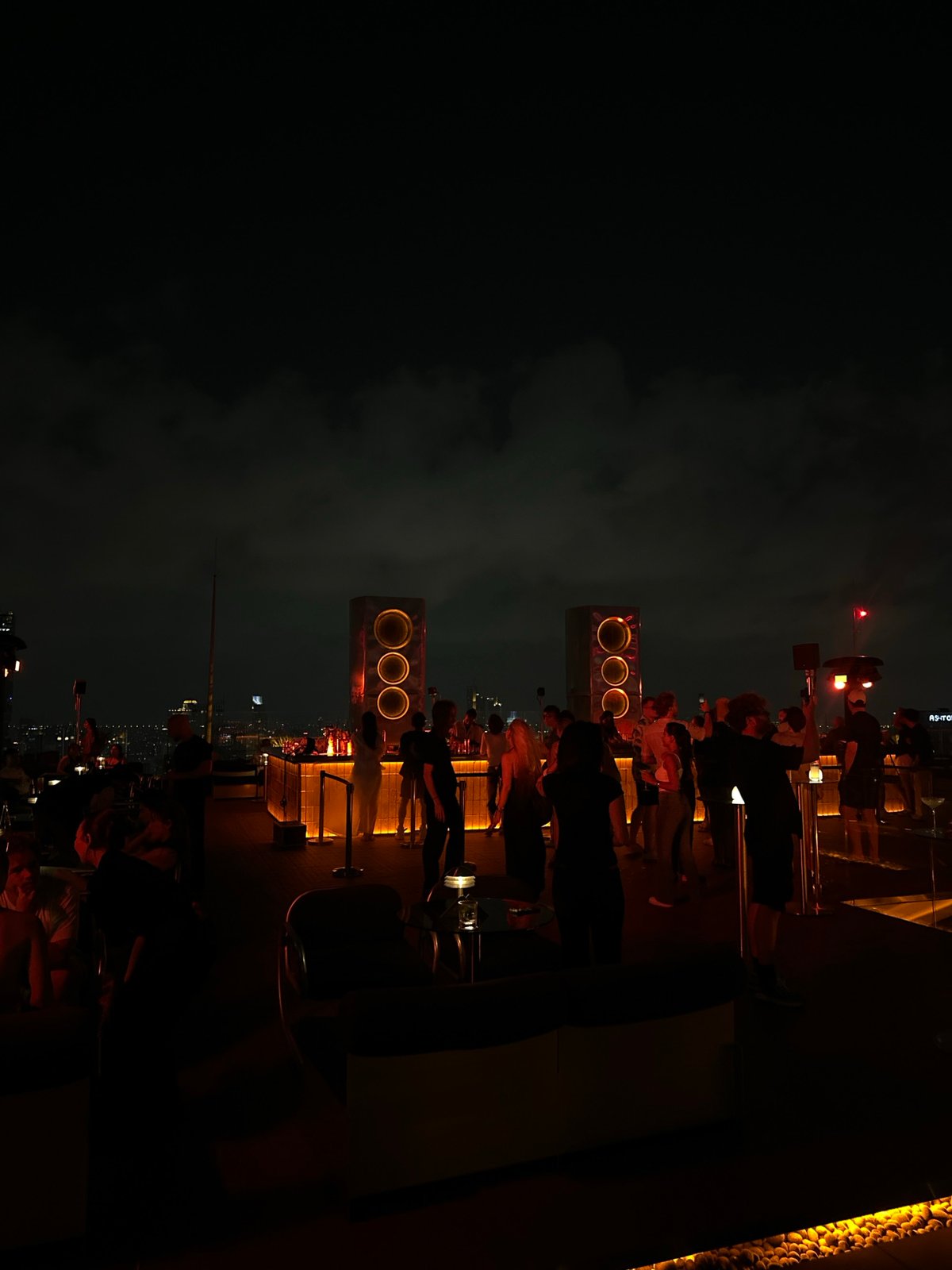 Bangkok indoor scenes: rooftop bar gathering, empty modern corridor