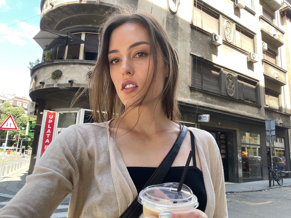 Midday street-level moments in Belgrade, July 2026