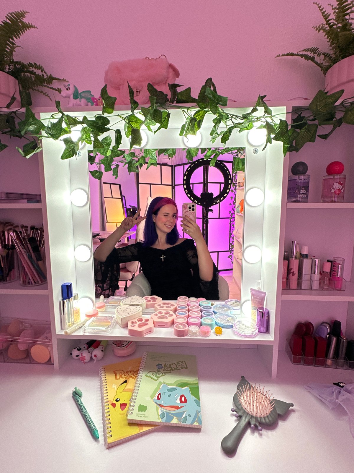 Mirror selfies under LED vanity lights in Oviedo