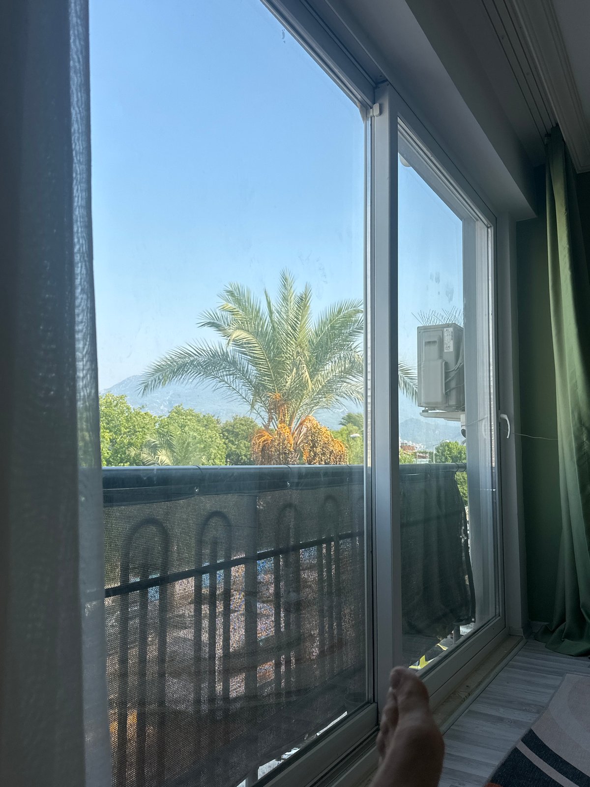 Fethiye apartment afternoon: mountain views and a robot vacuum