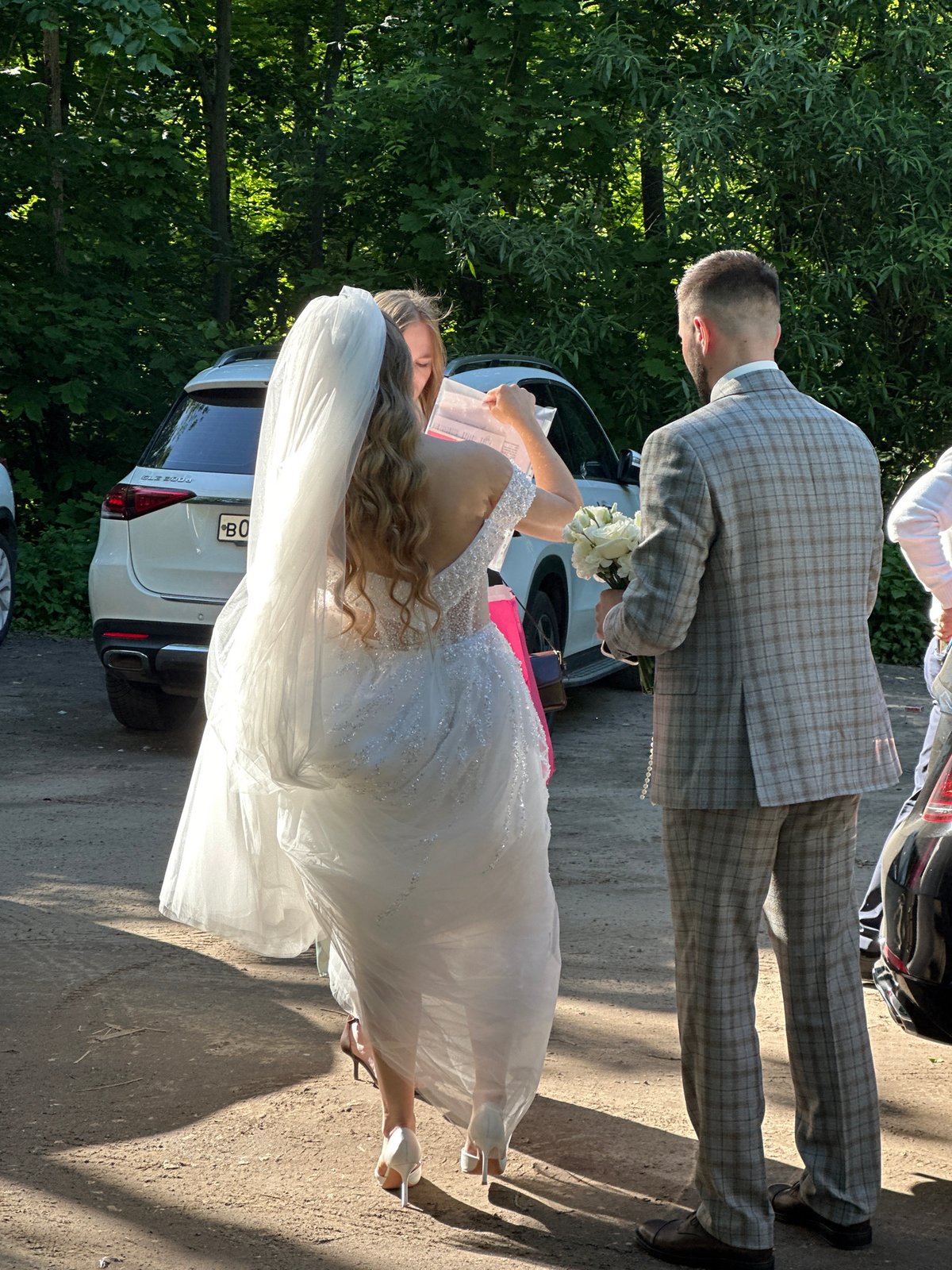 Outdoor wedding celebration observed in Nizhny Novgorod park setting