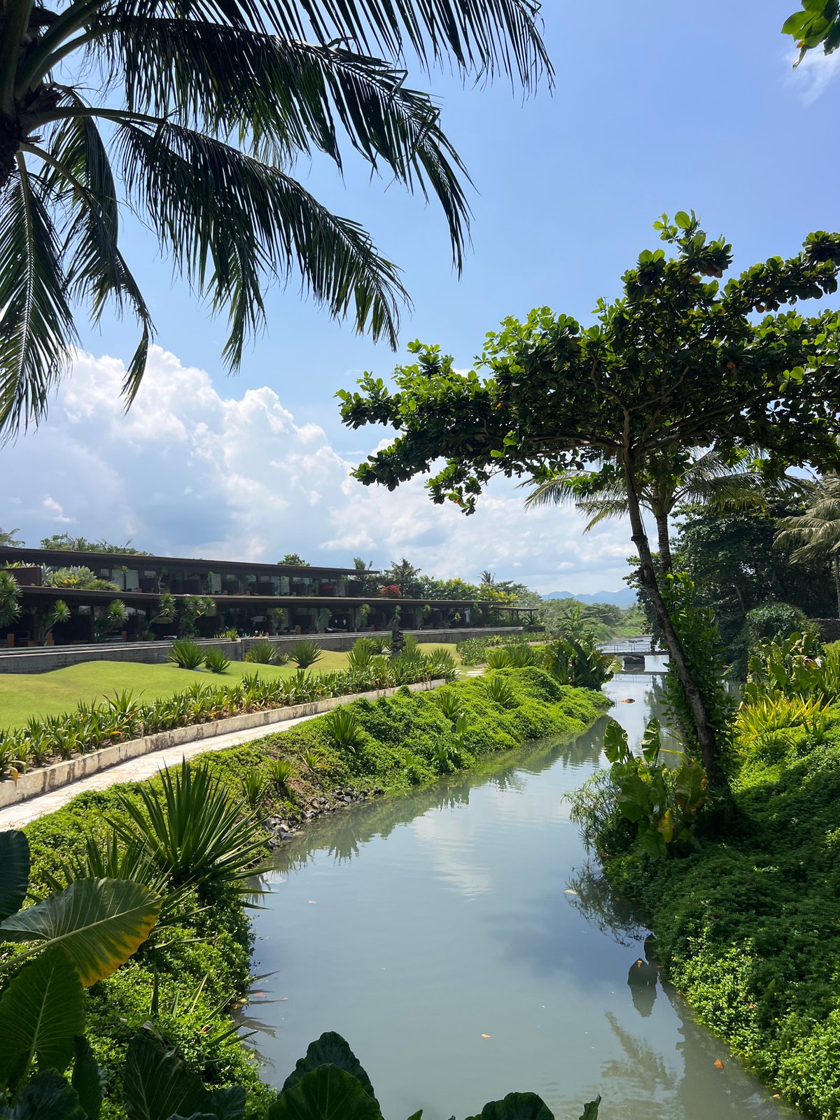 Tourist documents scenic walk through Blahbatuh Indonesia resort areas