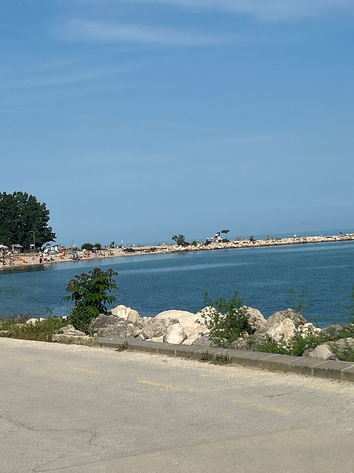 Coastal waterfront pathway documented in brief observation sequence