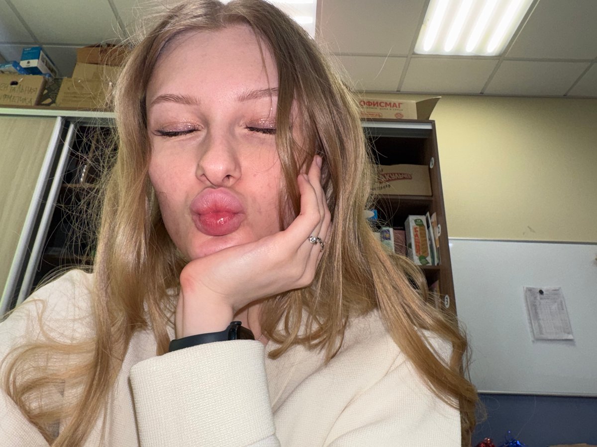Woman takes selfies in various poses in Perm