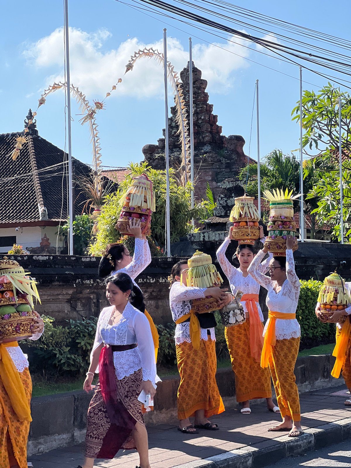 Balinese procession and everyday street life in North Kuta