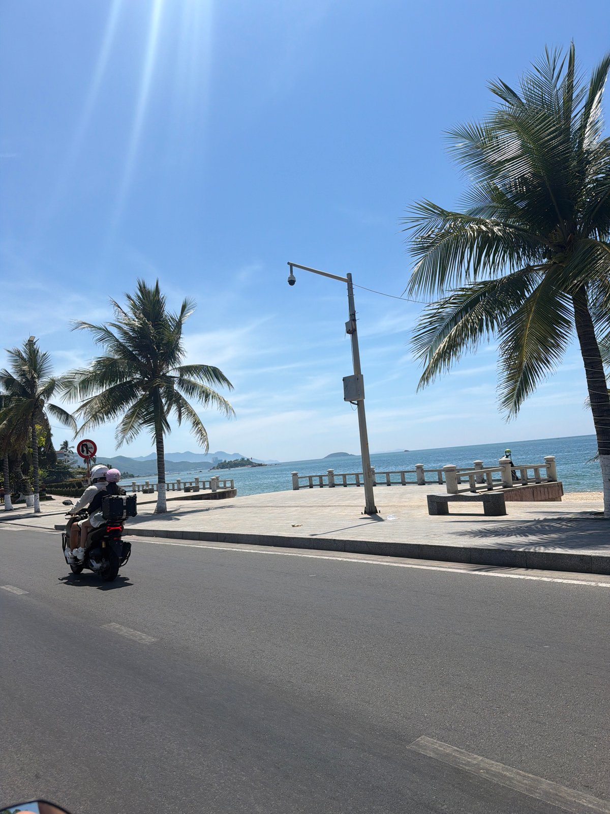 Sunny day exploring Nha Trang's coastal roads and city scenes