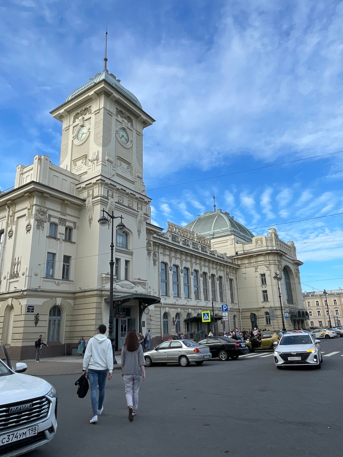 Vitebsky Station's ornate facade and trolley-wired streets, Saint Petersburg
